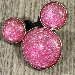 Mickey Mouse’s pink glitter pin